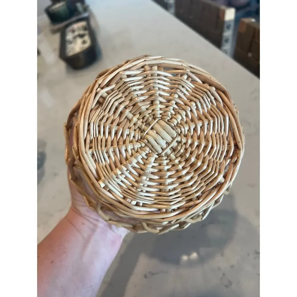 Small glass and wicker vase